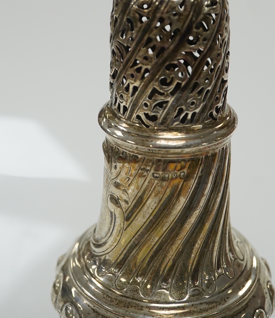 A Victorian repousse spiral fluted pedestal sugar caster, Thomas Bradbury & Sons, London, 1889, 18.3cm, 3.9oz. Condition - fair